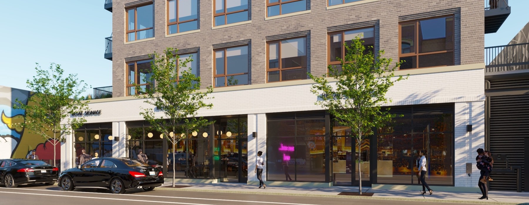 a building with cars parked in front