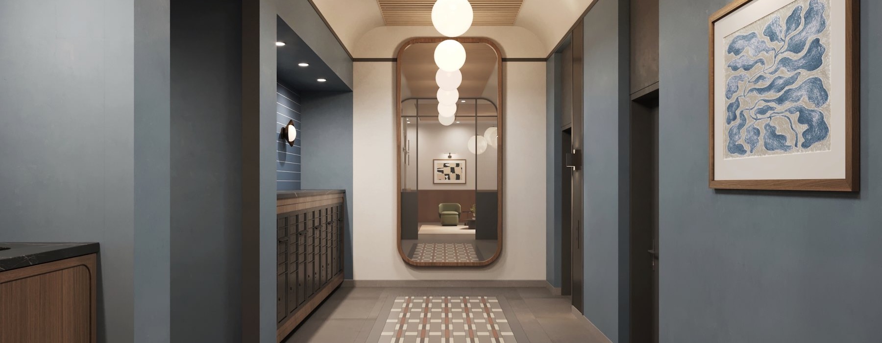 a hallway with a rug and a light on the wall